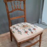 Chaise basse tapissée