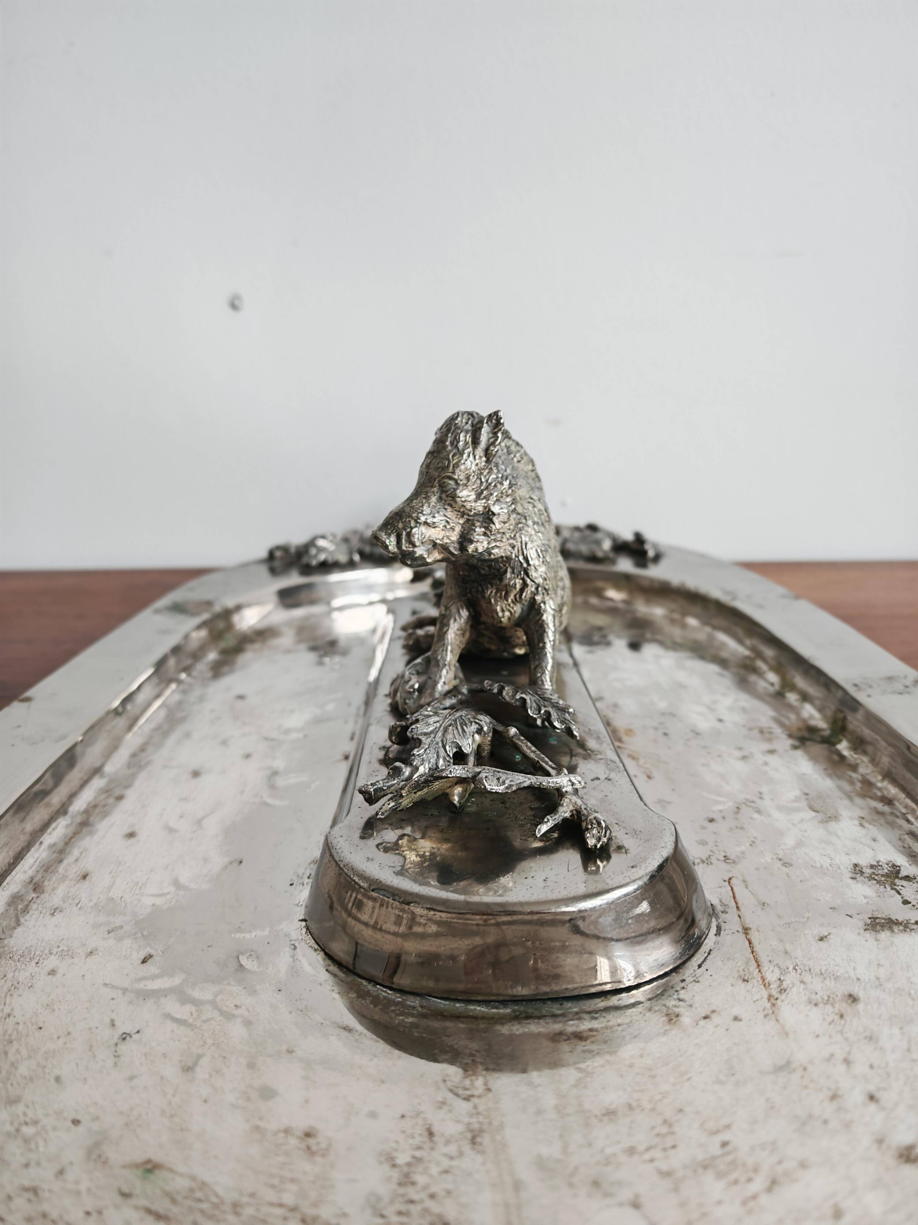 Silver serving dish by Franco Lapini with boar sculpture.