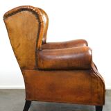 Irresistible old sheep leather wingback armchair with the most beautiful colors