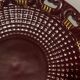 Burgundy and gold openwork plate in ceramic from Saint-Clement, 1950s.