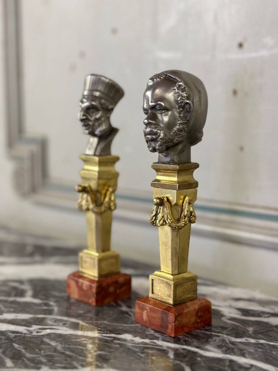 Pair of Abyssinian busts in nickel on gilded bronze and marble bases, 19th century.