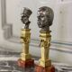 Pair of Abyssinian busts in nickel on gilded bronze and marble bases, 19th century.