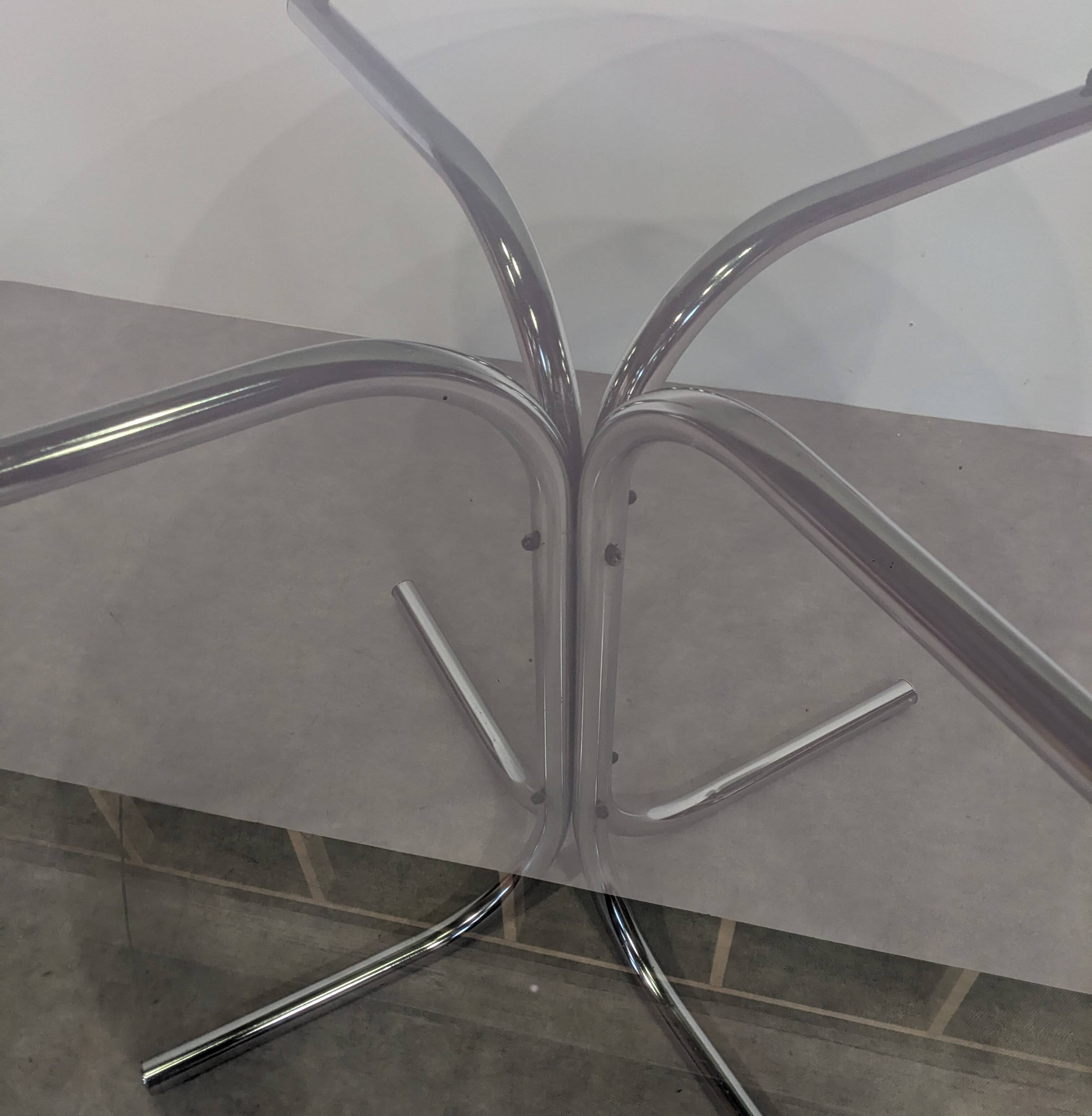 70s round table with smoked glass and chrome