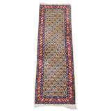 Colorful oriental runner with contrasting borders and cozy patterns, measuring 314x92 cm