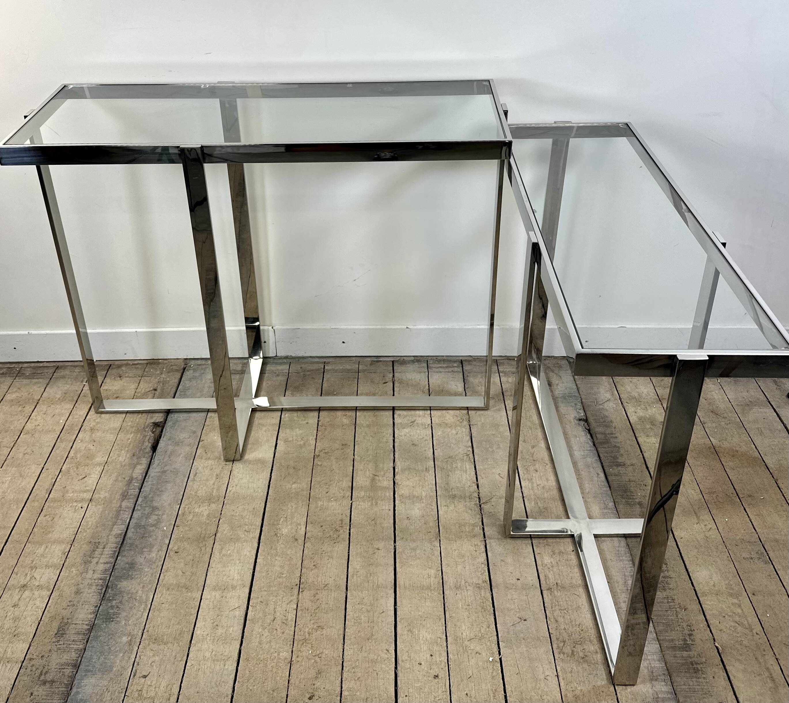 Chrome metal and glass console from the 2000s.