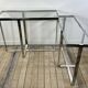 Chrome metal and glass console from the 2000s.