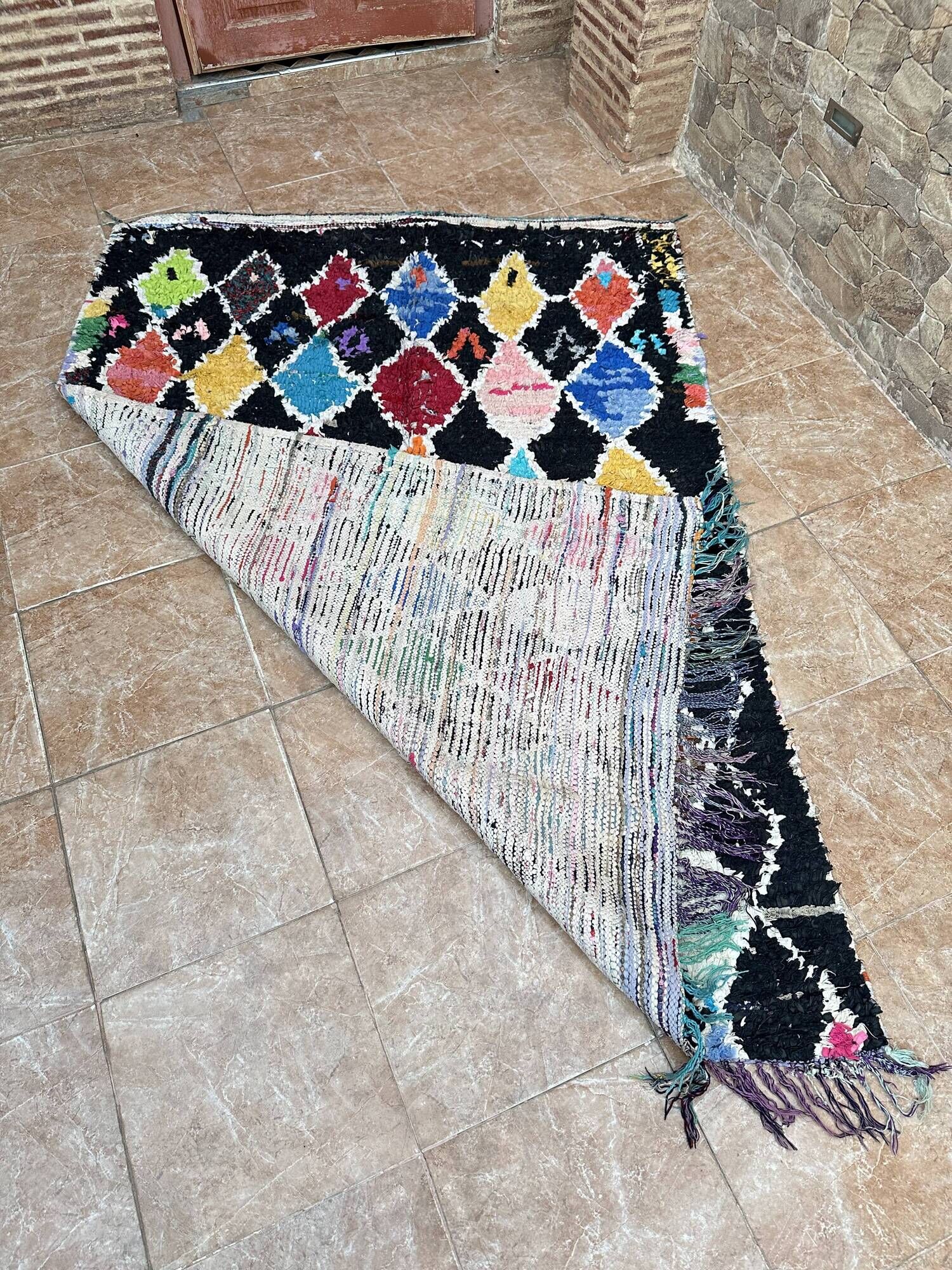 Vintage Boucherouite Berber rug: Hand-knotted Moroccan rug.