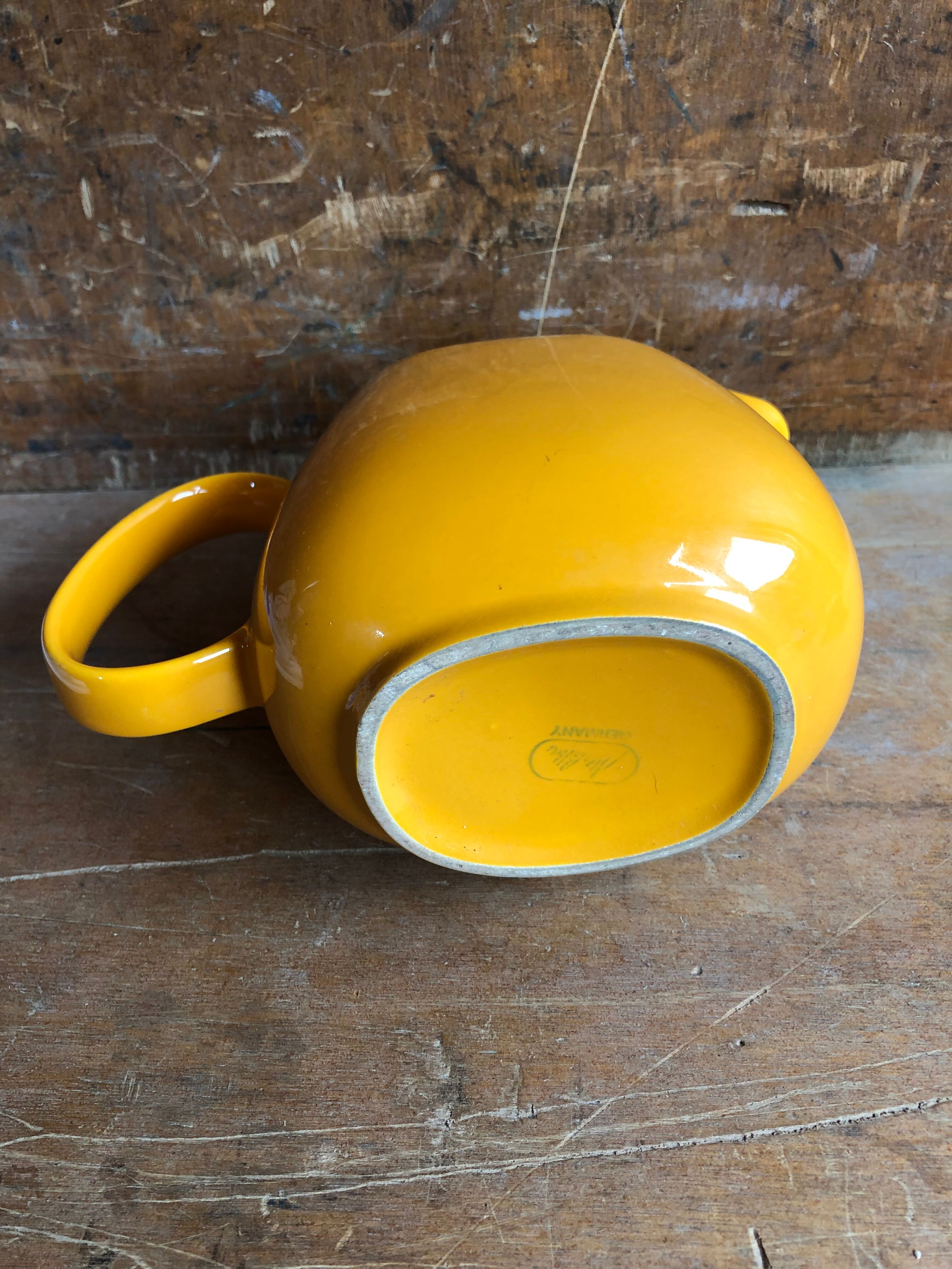 Old yellow ceramic pitcher made in germany 70s vintage