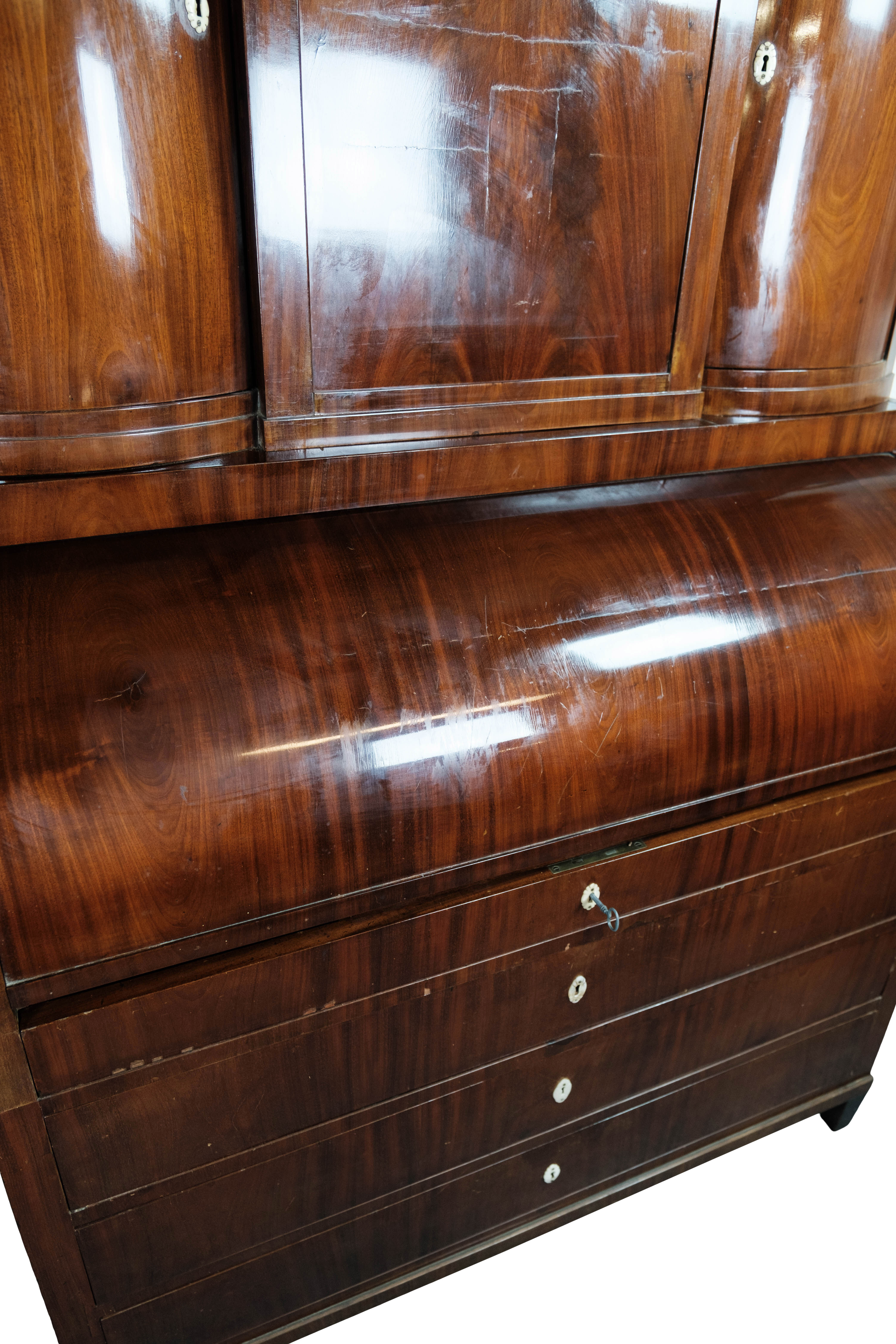 Empire bureau of polished mahogany with inlaid wood, 1840s