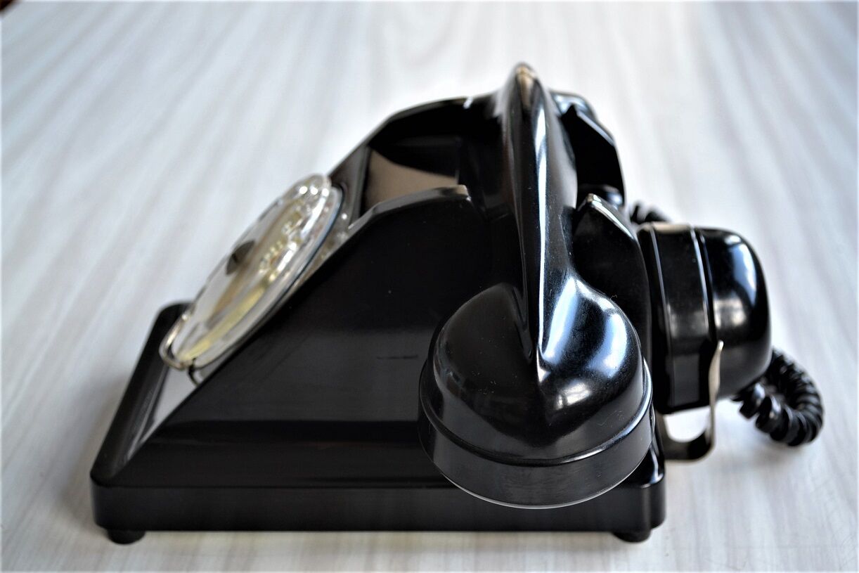 Bakelite dial PTT phone with 1960s vintage earpiece