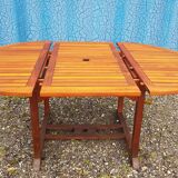 Stretchable garden dining table in solid teak