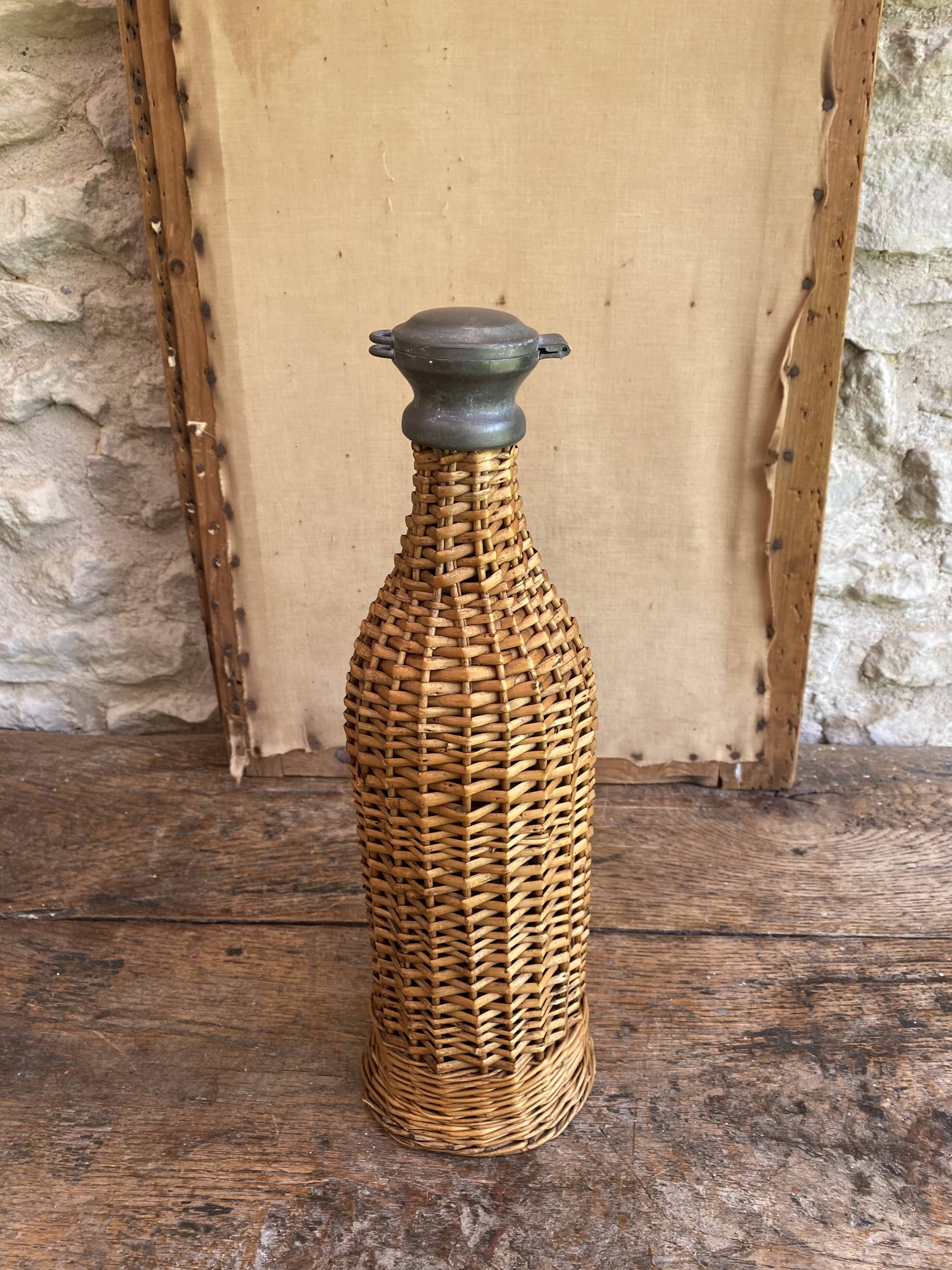 Woven wicker bottle