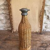 Woven wicker bottle