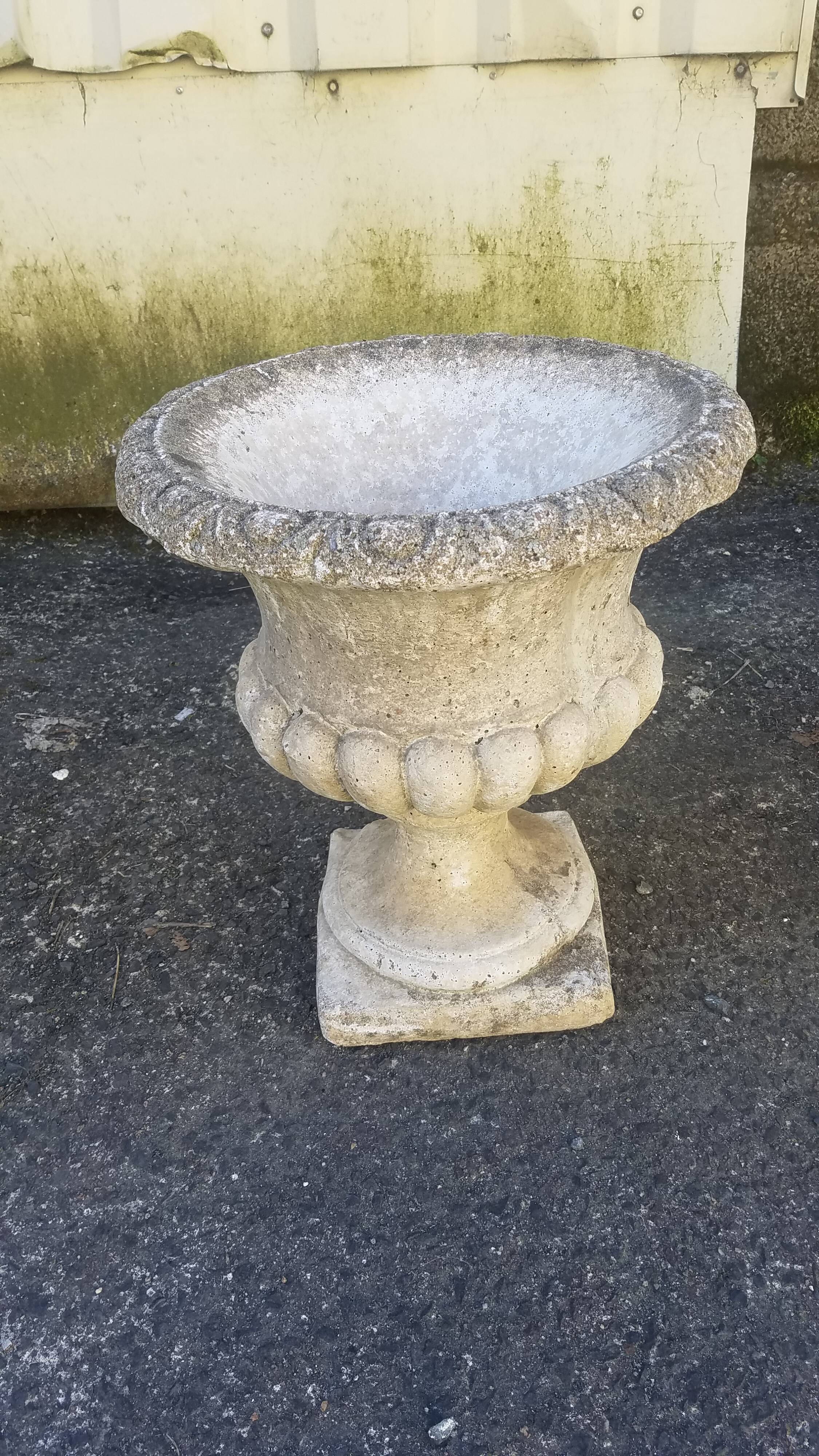 Pair of mediterranean vases in reconstructed stone