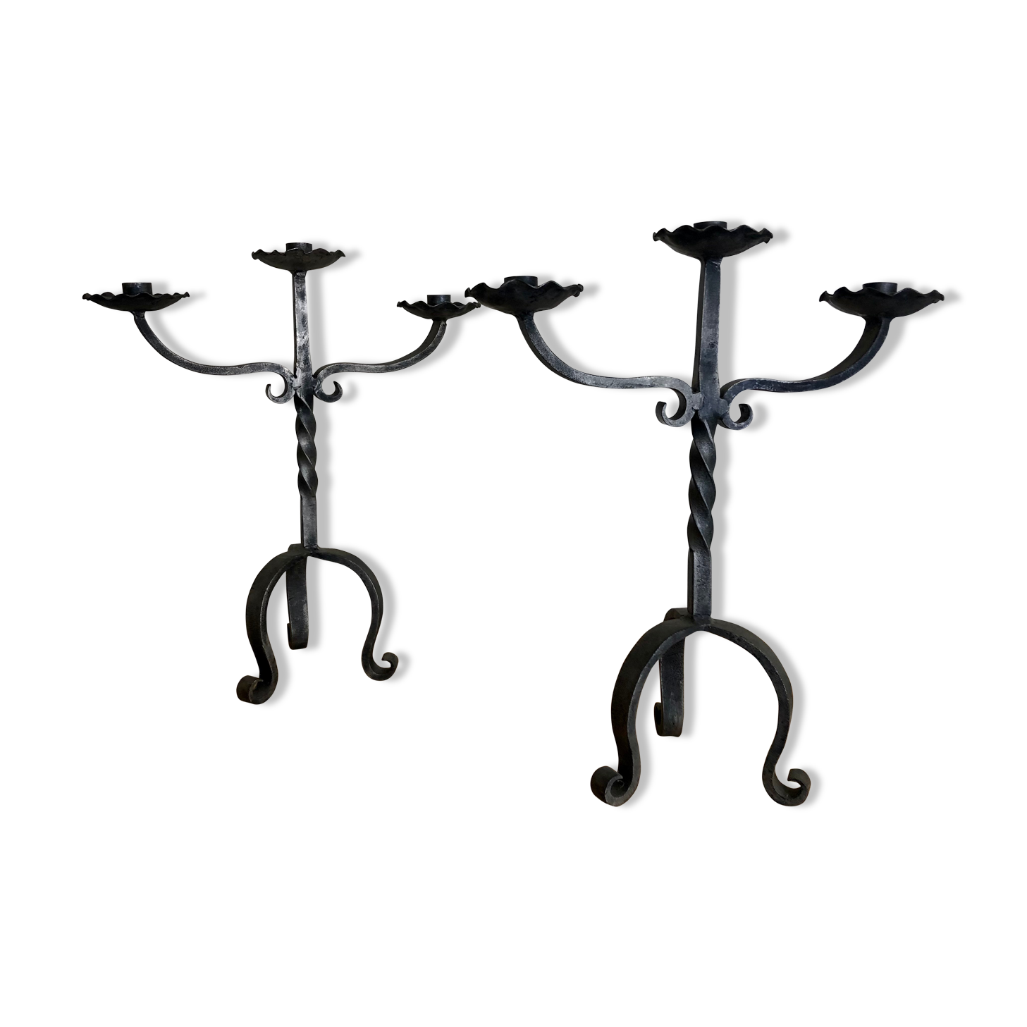 Pair of wrought iron candlesticks
