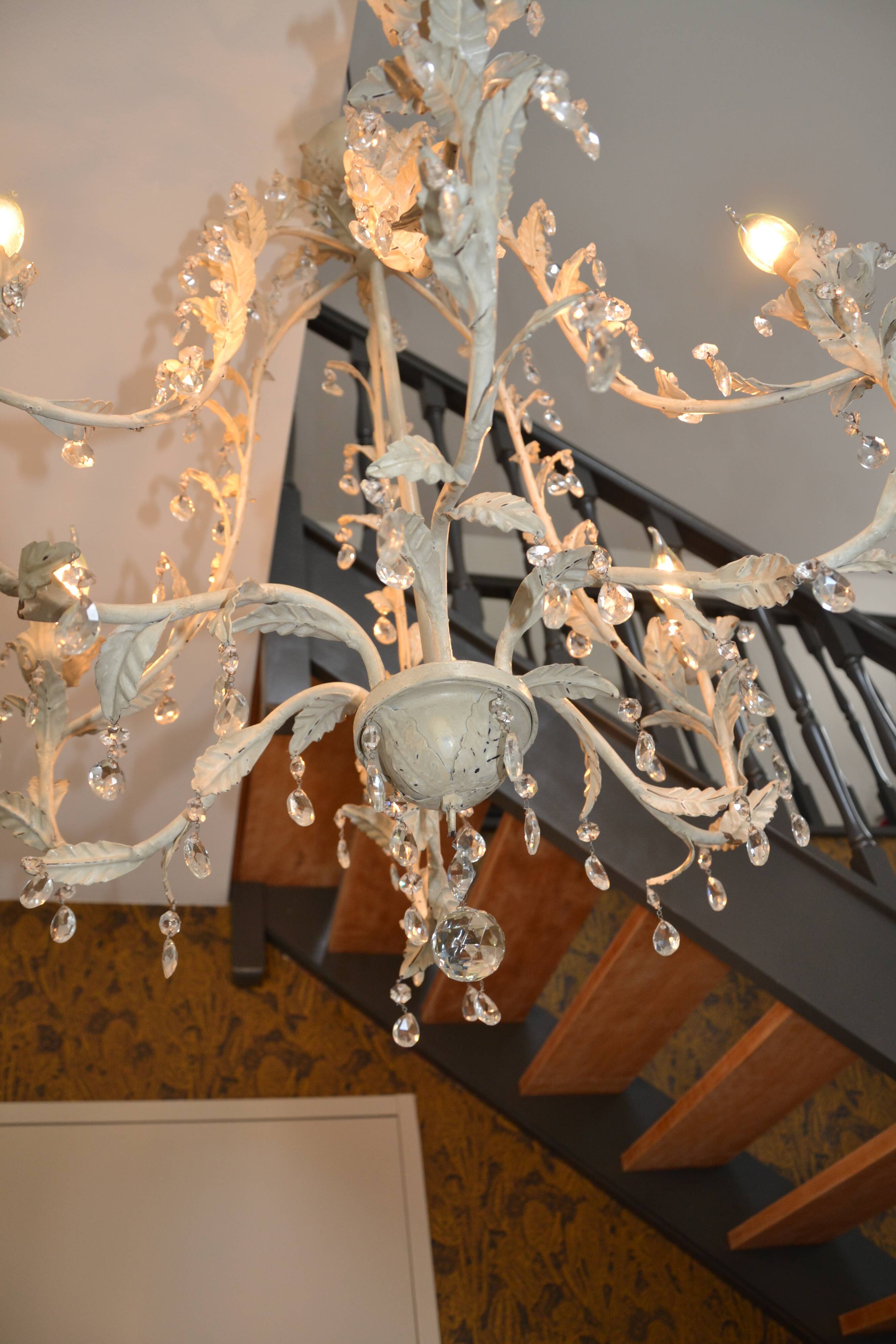 Large cage chandelier in aged metal.