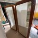 Pair of rounded mirrored wardrobes