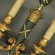 Pair of large wall sconces in quiver style Empire - bronze / green patina