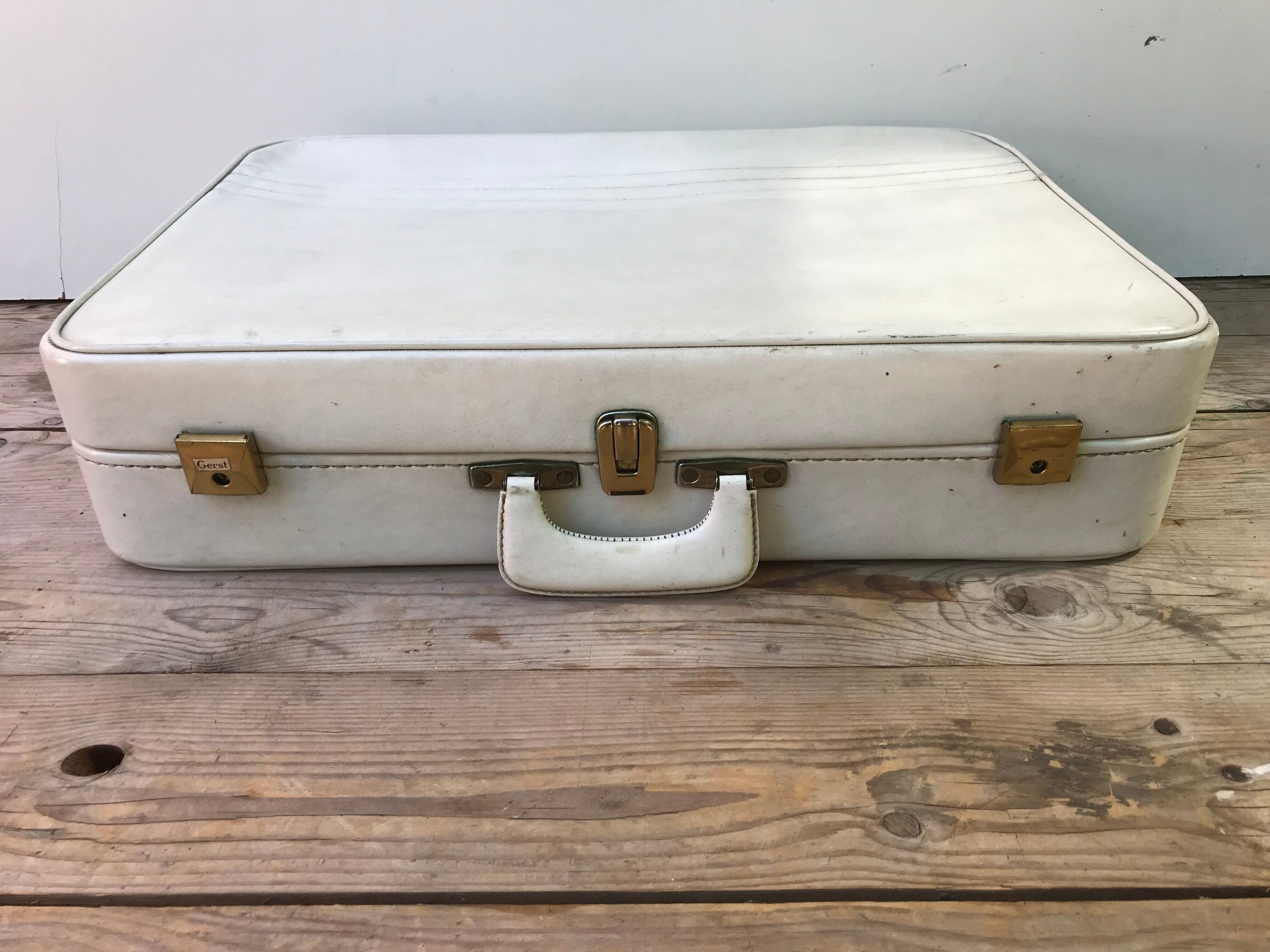 Old white leather case with vintage 70s leather handle