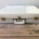 Old white leather case with vintage 70s leather handle