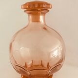 Service with vintage liqueur in pink rosaline glass
