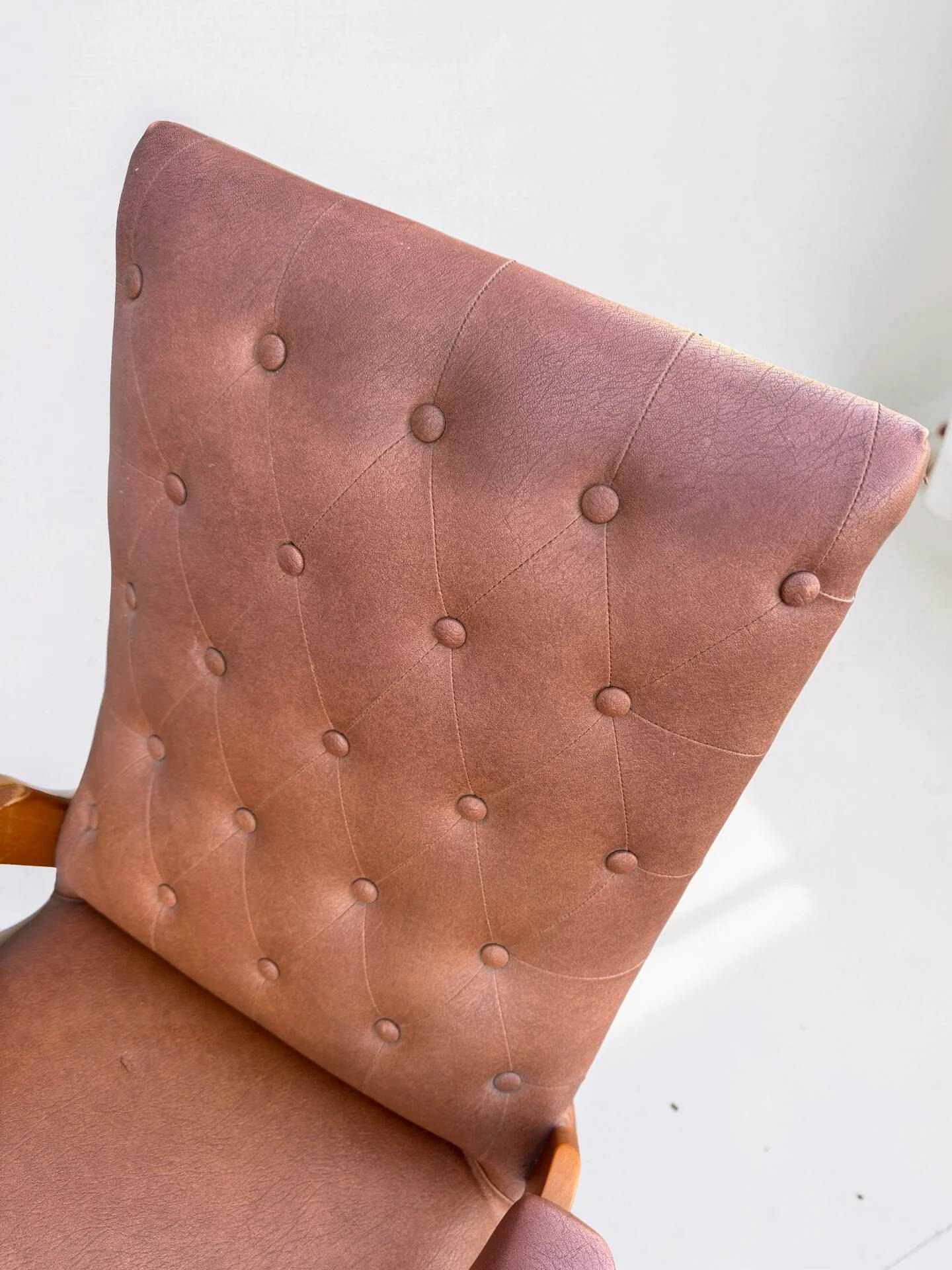 Vintage armchair in light brown faux leather, 1960s.