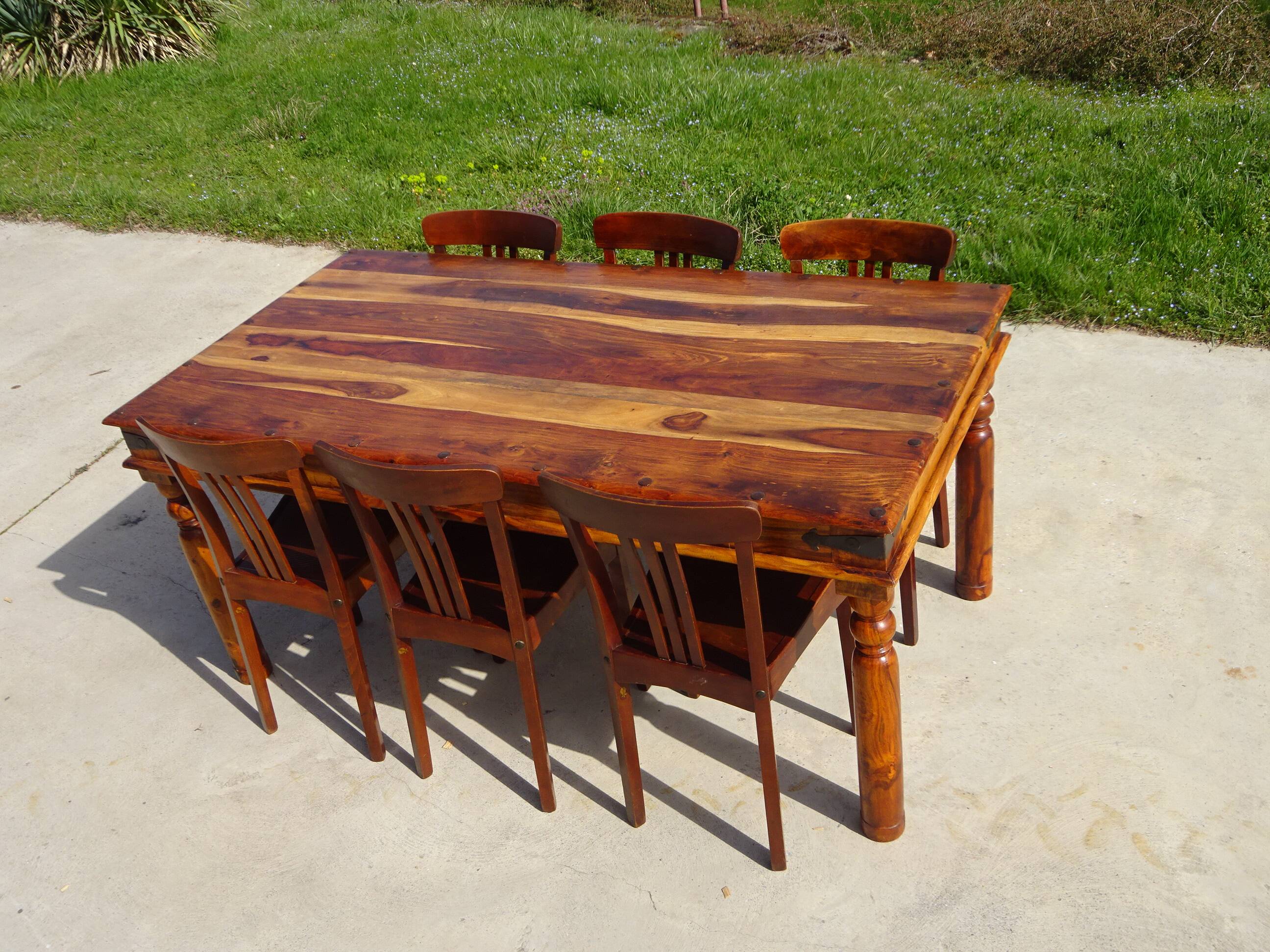 Solid wood and wrought iron table