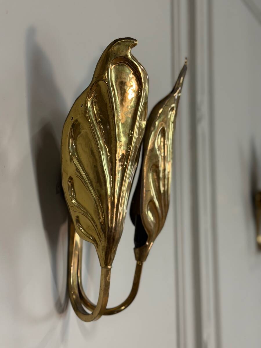 Set of four gilt brass wall lights, Tommaso Barbi, circa 1960.