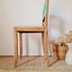 Chaise ancienne rénovée – bois sculpté et dossier vert