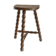 Tabouret tripode aux pieds tournés