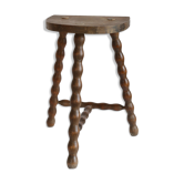 Tabouret tripode aux pieds tournés
