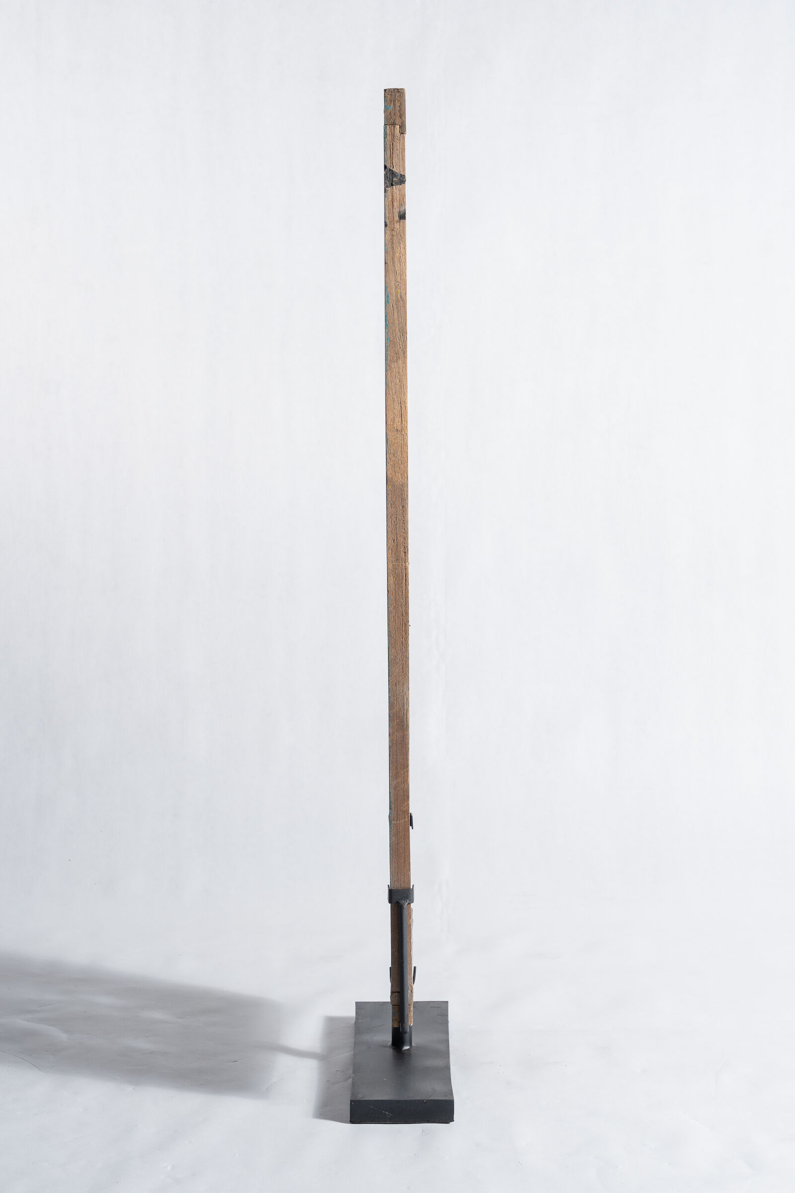 Rectangular Indonesian construction element with blue and yellow plant in carved wood