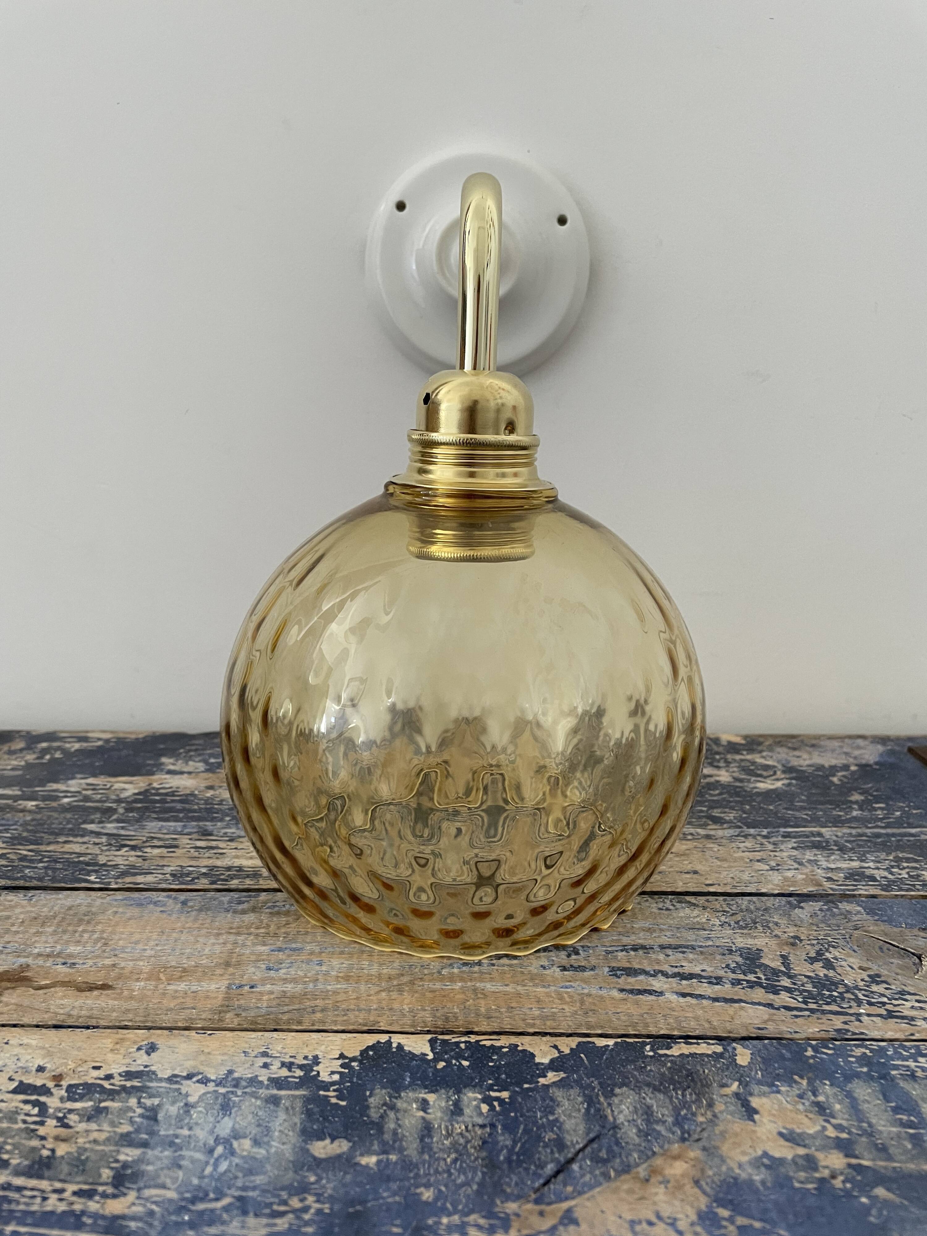 New electrified golden globe wall lamp