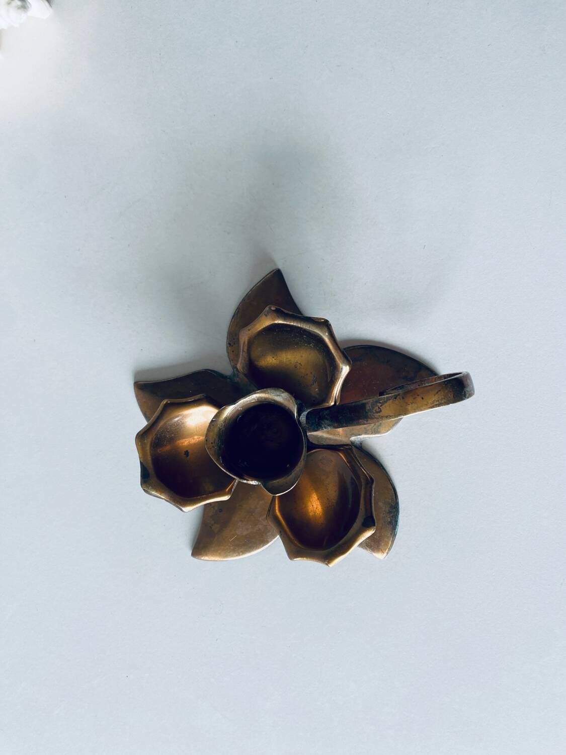 Brass flower candle holder
