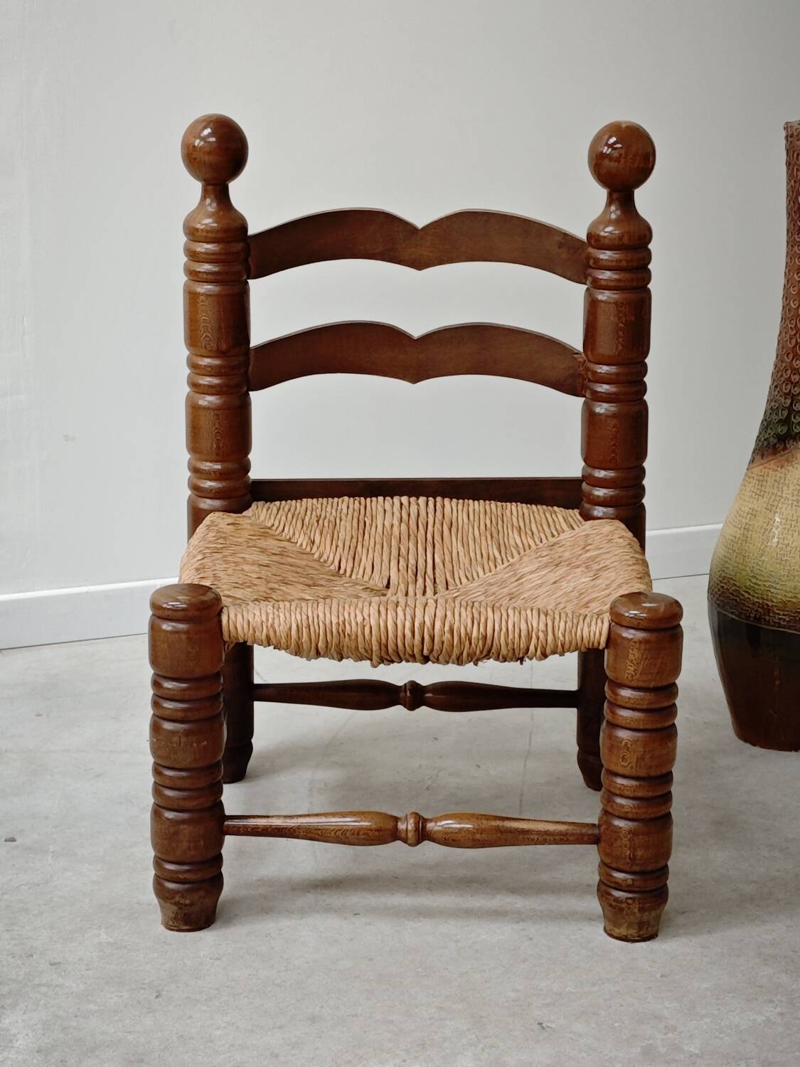 Small Charles Dudouyt chair in wood and straw