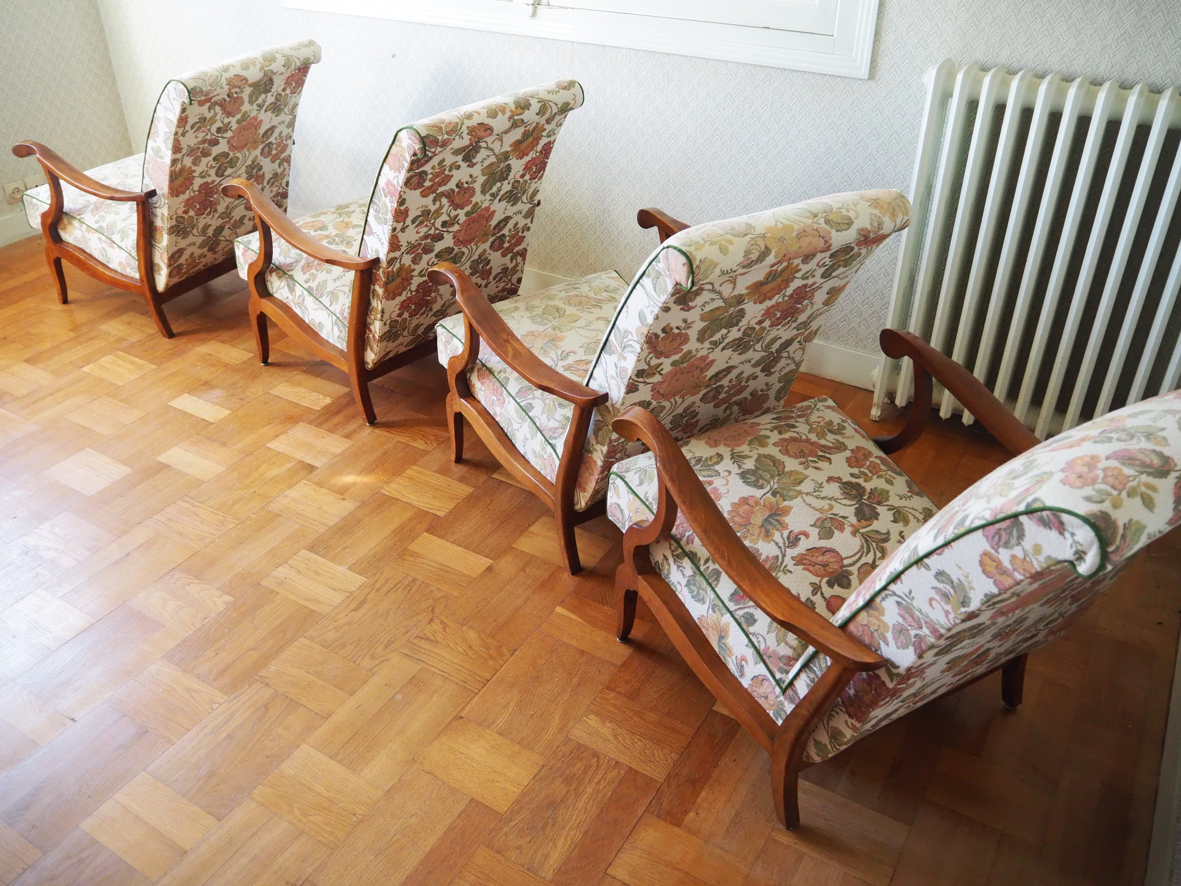 Four 1950s armchairs - wooden armrests