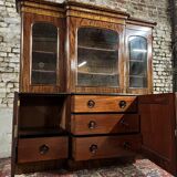 Projection bookcase in flamed mahogany from the 19th century