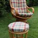 Swivel rattan armchair with matching ottoman