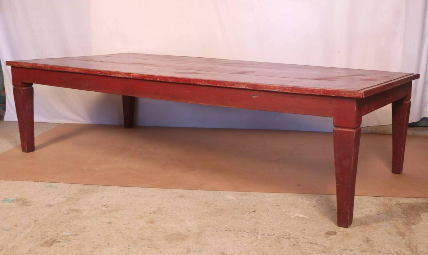 Antique Burmese teak coffee table with original red patina