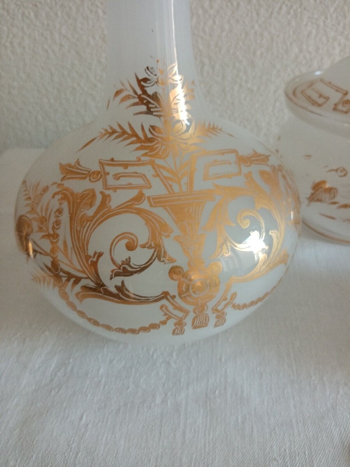 Suite Carafe, Carafon and Pot Opaline with gilded decorations XIX th