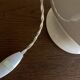 Neo-classical baluster lamp in cracked white earthenware from the 1970s.
