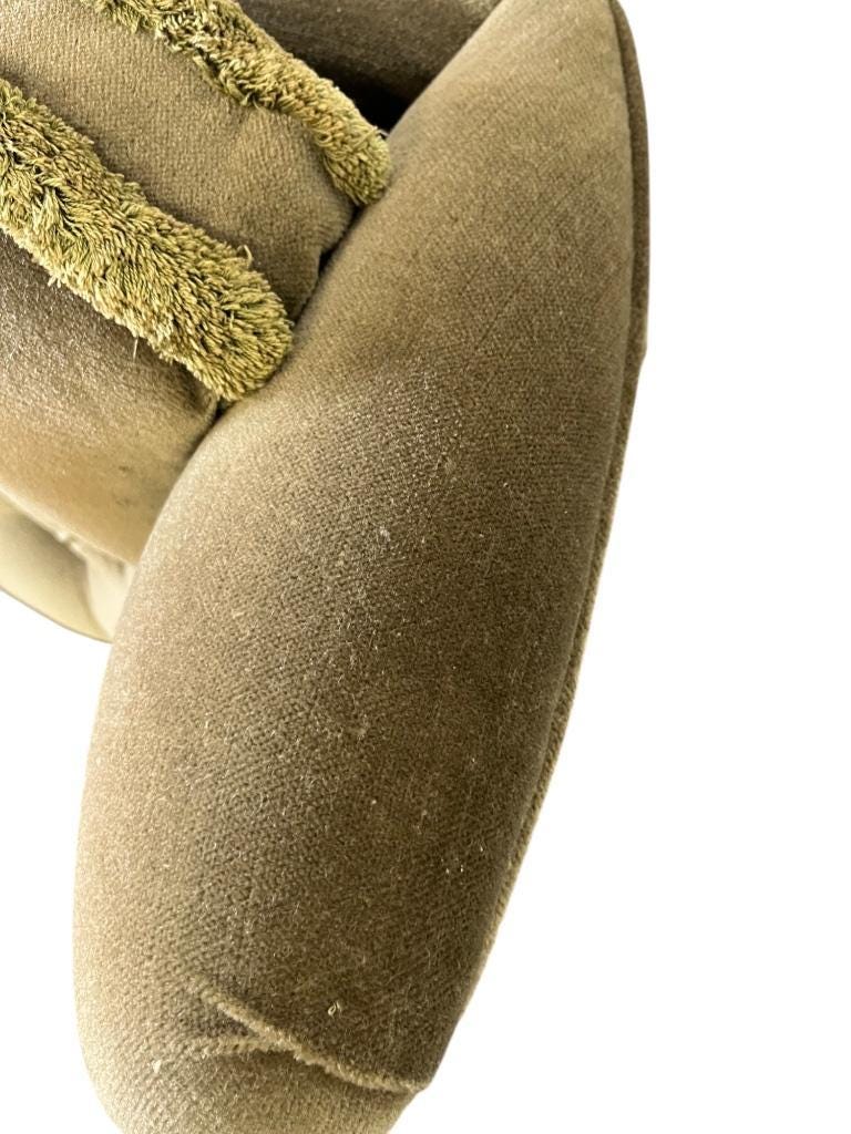 Vintage green two-seater sofa with fringes