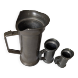 Set of small pewter measuring jugs