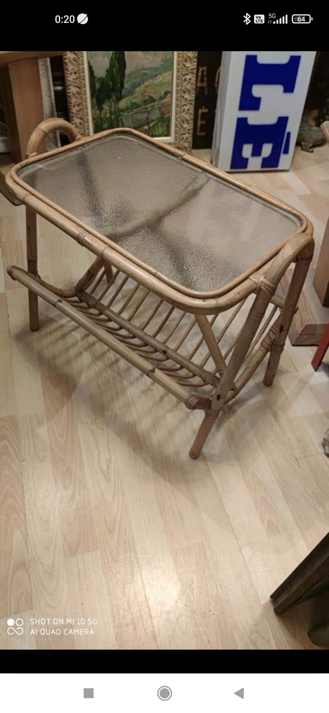 Rattan and frosted glass end table with magazine rack