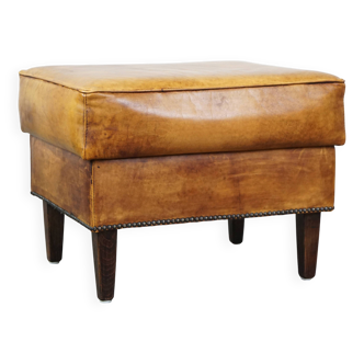 Large cow leather ottoman with decorative nails