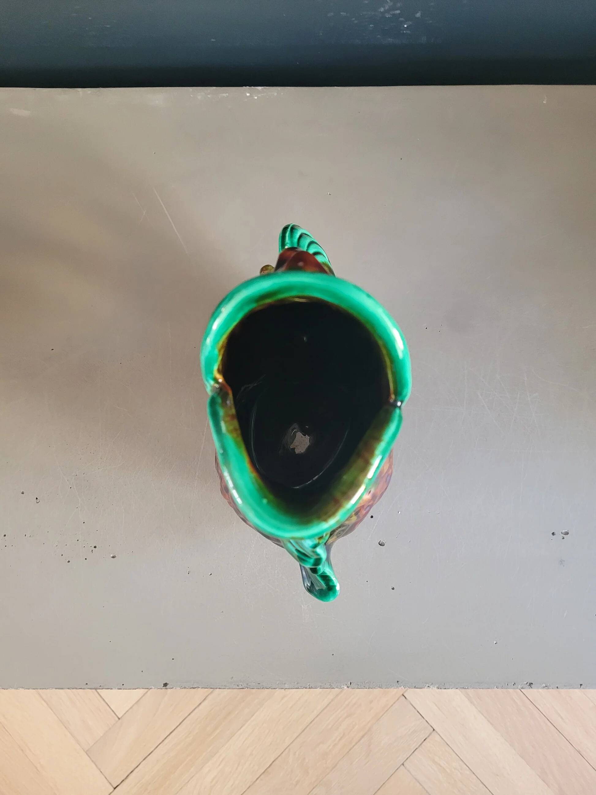 Old ceramic fish jug