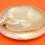 1970s Onyx ashtray with a gold metal rim.