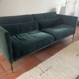 Dark green velvet sofa