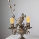 Pair of wall sconces with parrots and leaves