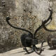 Brutalist pair of wall-mounted coat hooks.